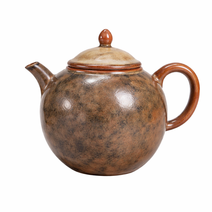 Brown ceramic teapot with a lid on a white background
