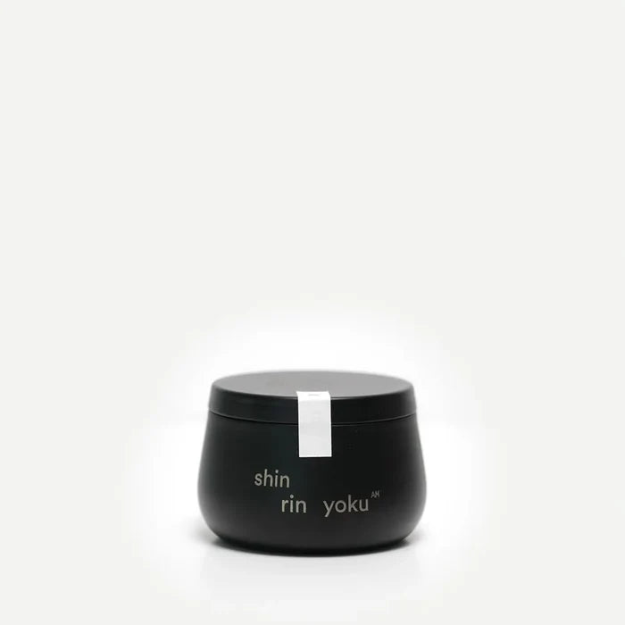 Black container with 'shin rin yoku' text on a white background
