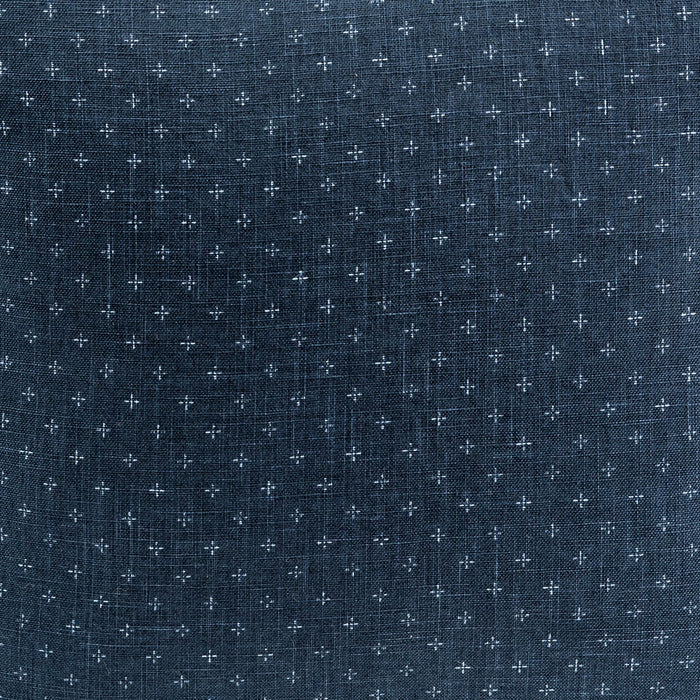 Navy blue fabric with small white cross pattern