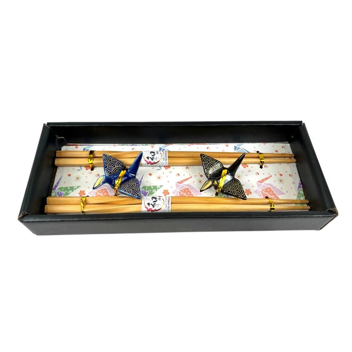 Crane-themed product in a black box on a white background