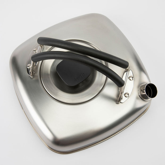 Stainless steel tea pot with cover and black handle on a white background