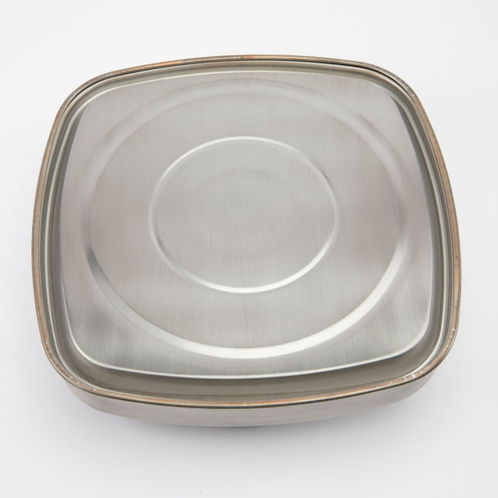Square stainless steel metallic teapot bottom on a white background